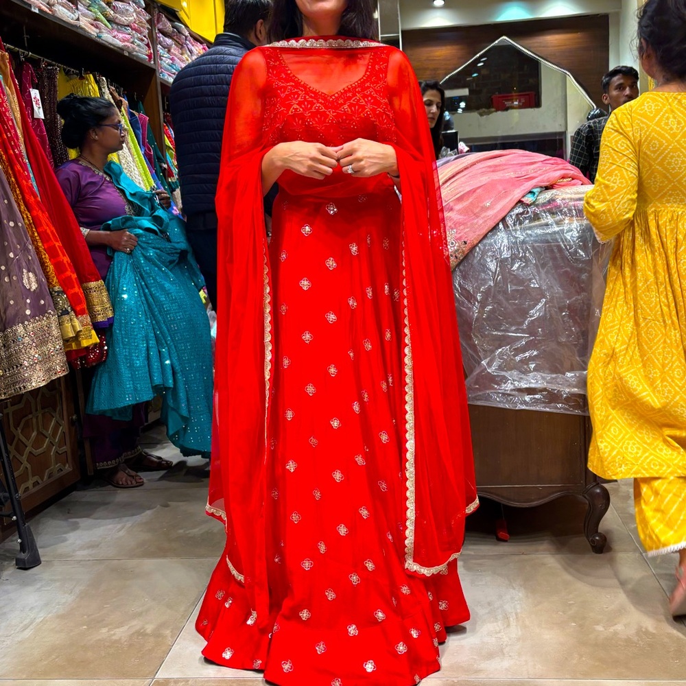Beautiful red and gold  lengha. Comes with dupatta, top and skirt. Never worn.
